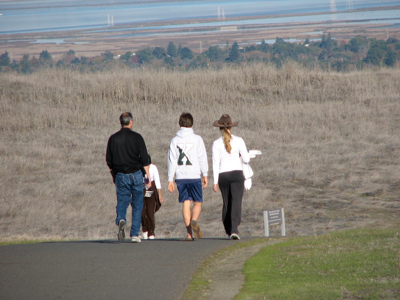 Steve and Laurene have a walk on the hills around Stanford with their son Reed, in late 2006